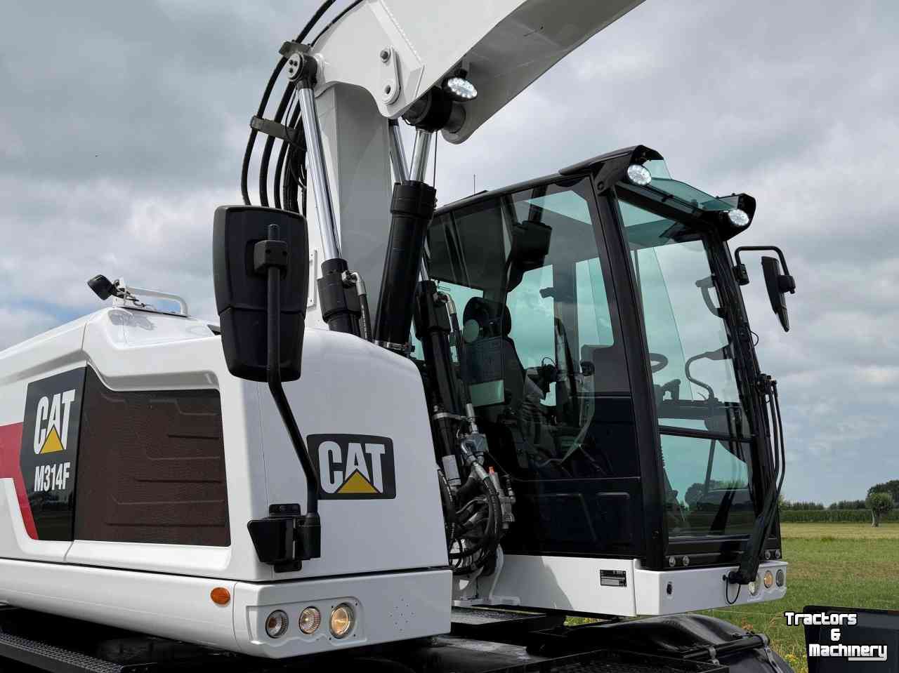 Pelles sur pneus Caterpillar Cat M314F - Engcon  Mobiele graafmachine Midejo