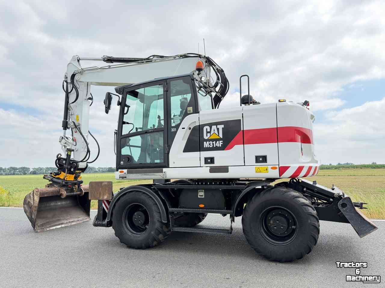 Pelles sur pneus Caterpillar Cat M314F - Engcon  Mobiele graafmachine Midejo