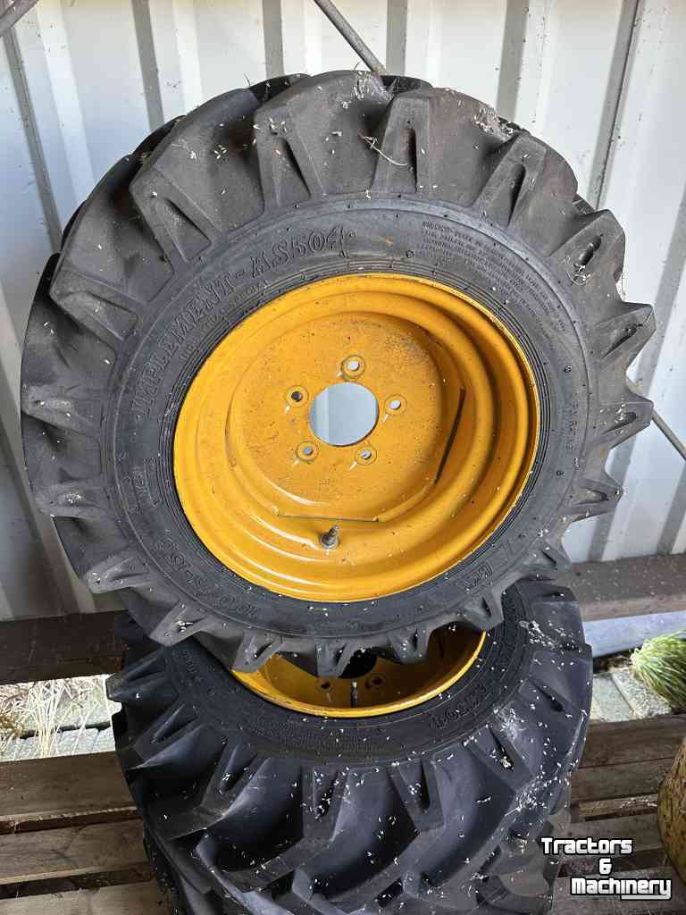 Roues, Pneus, Jantes, Barillets Jumelage  10.0/75-15.3 BKT inplement -AS504