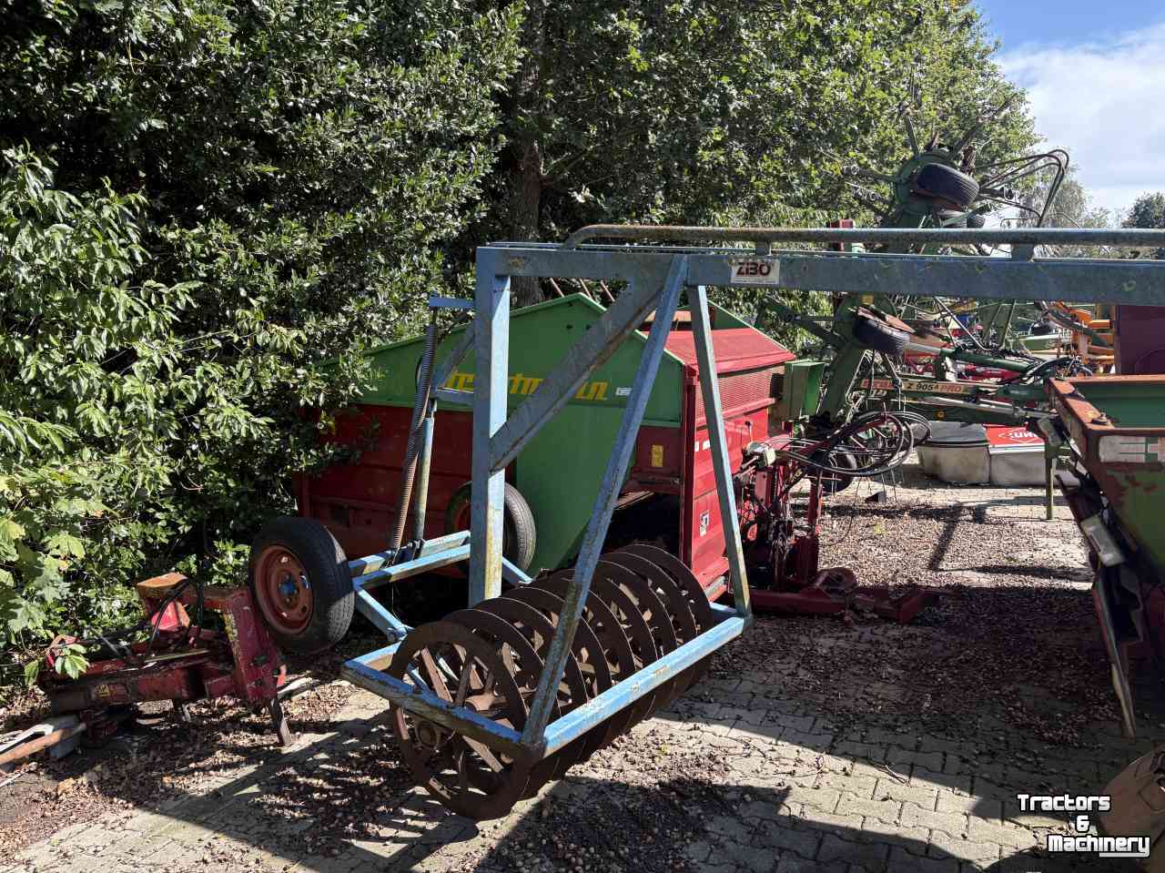 Rouleau compacteur latérale / avant Zibo Vorenpakker