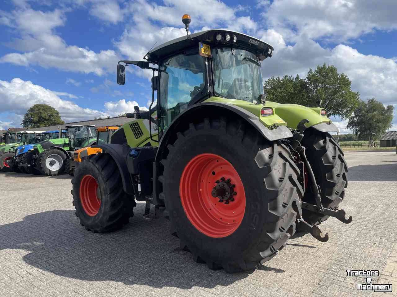 Tracteur Claas Axion 810 C-Matic Cebis (nieuw model, jaar 2015)