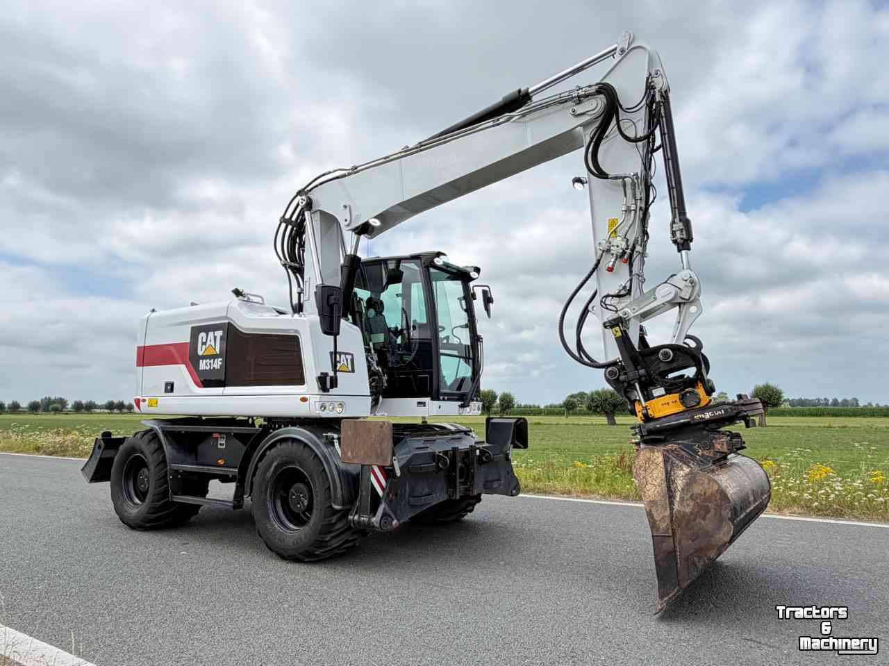 Pelles sur pneus Caterpillar Cat M314F + Engcon Mobiele graafmachine Midejo