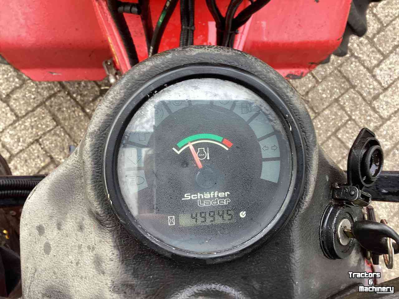 Chargeuse sur pneus Schäffer 2033 Kniklader