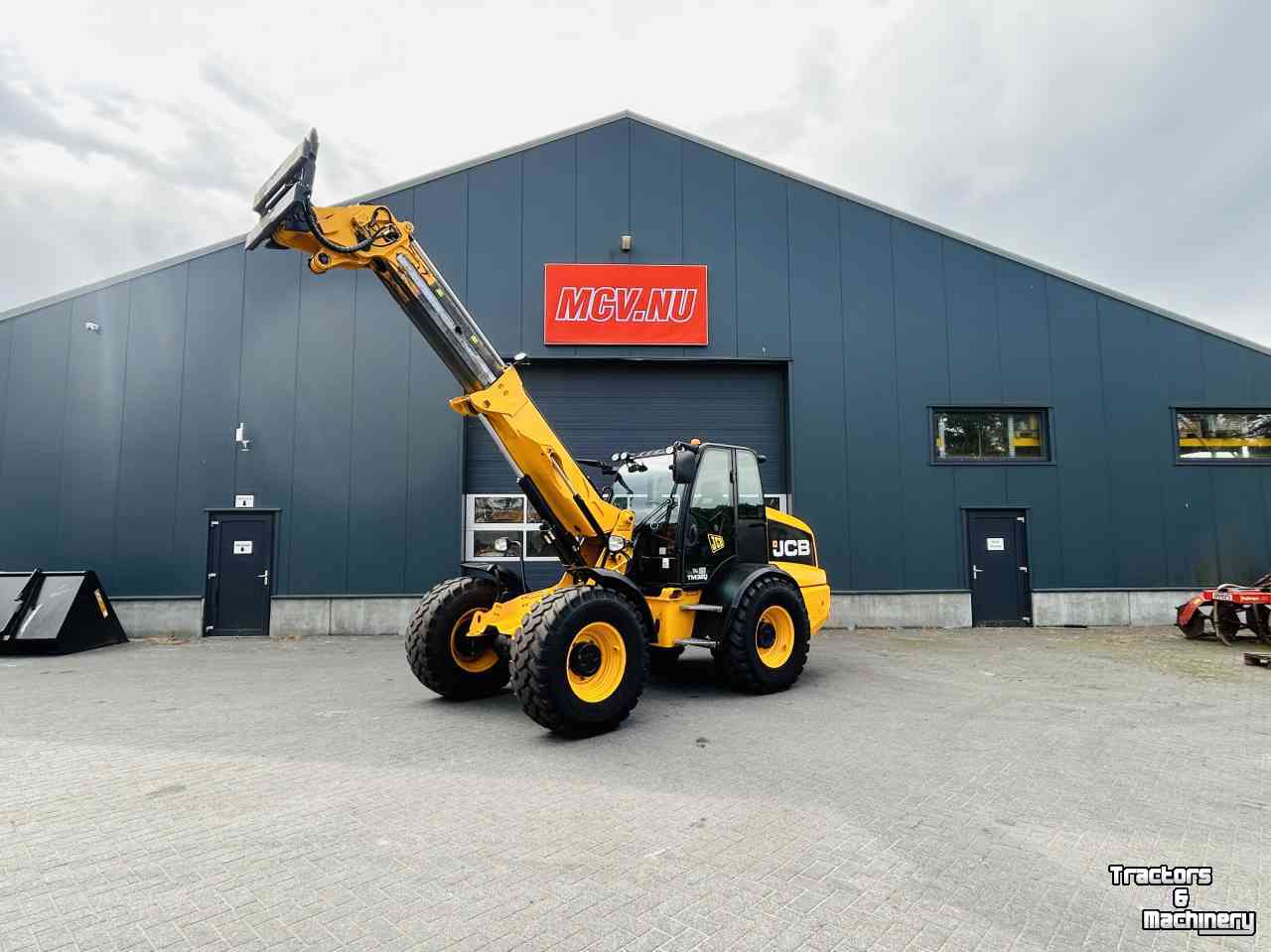 Chargeur Télescopique JCB TM 320 verreiker