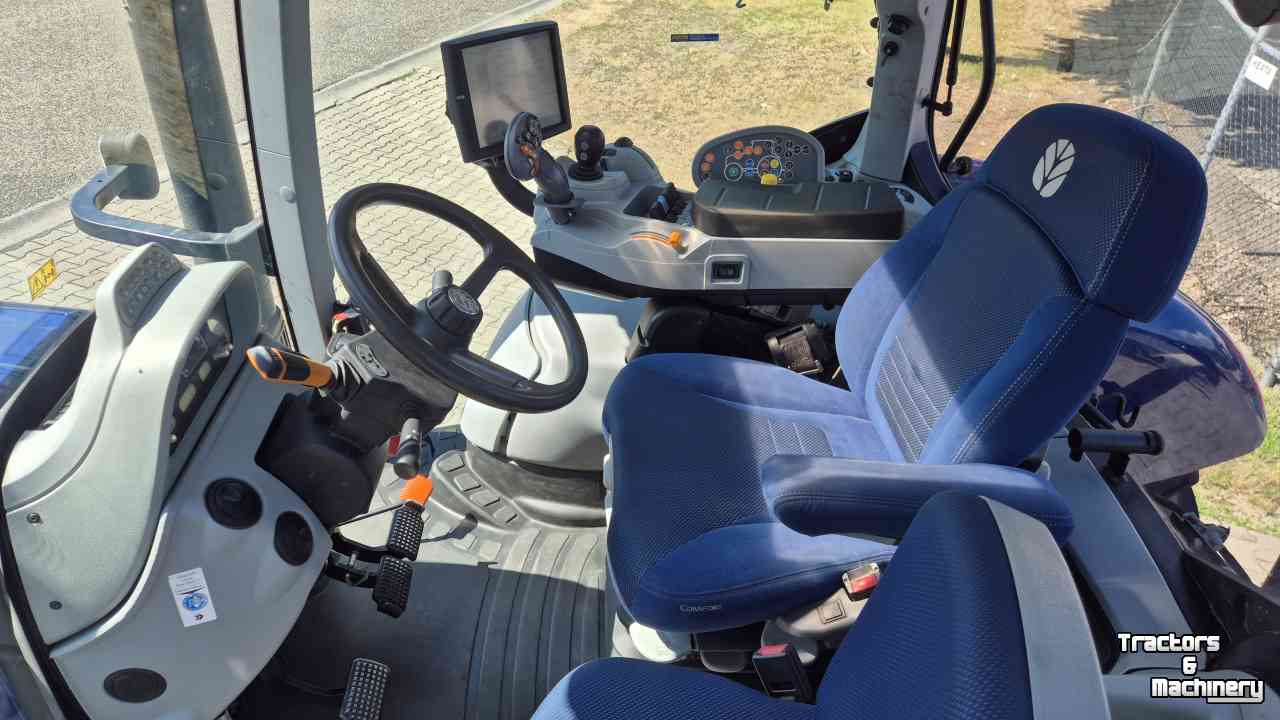 Tracteur New Holland T7.230 PC 40-eco, Lucht, Fronthef, geveerde cvooras en cabine BluePower