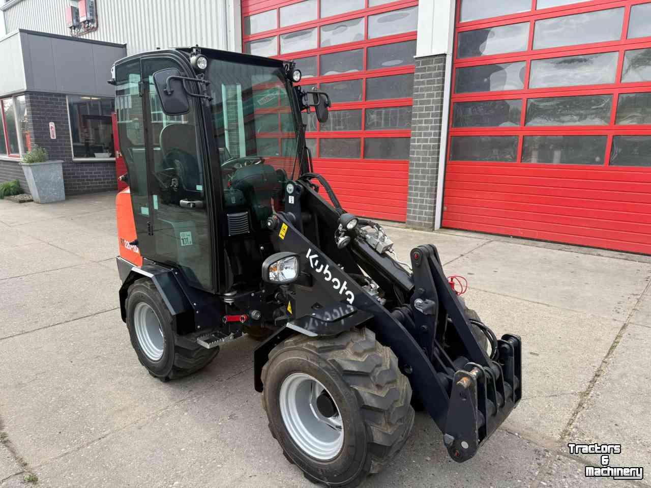 Chargeuse sur pneus Kubota RT220-2a nieuw. ( Giant G2300 X-tra HD ) Cabine
