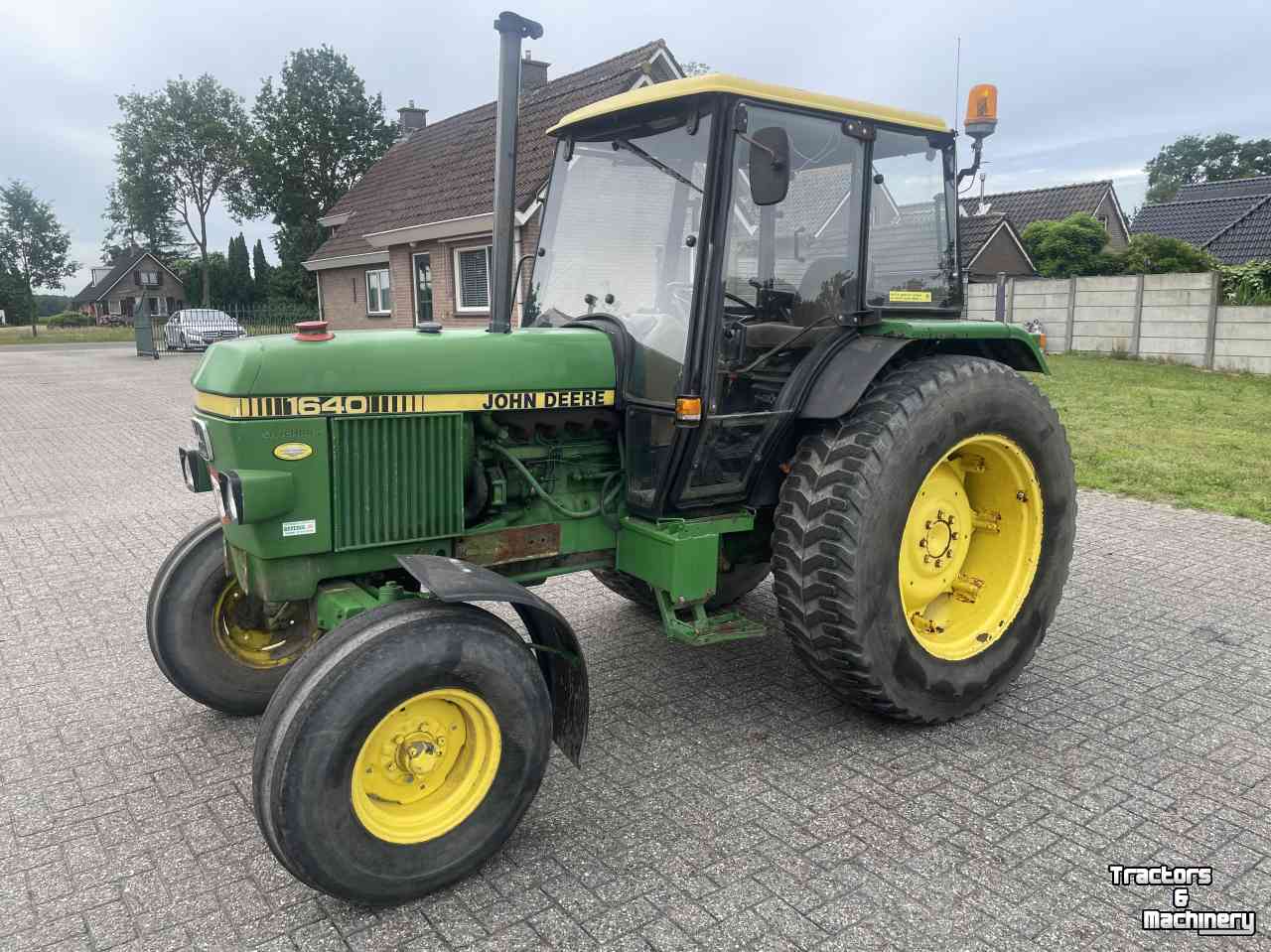 Tracteur John Deere 1640 MC-1 cab.