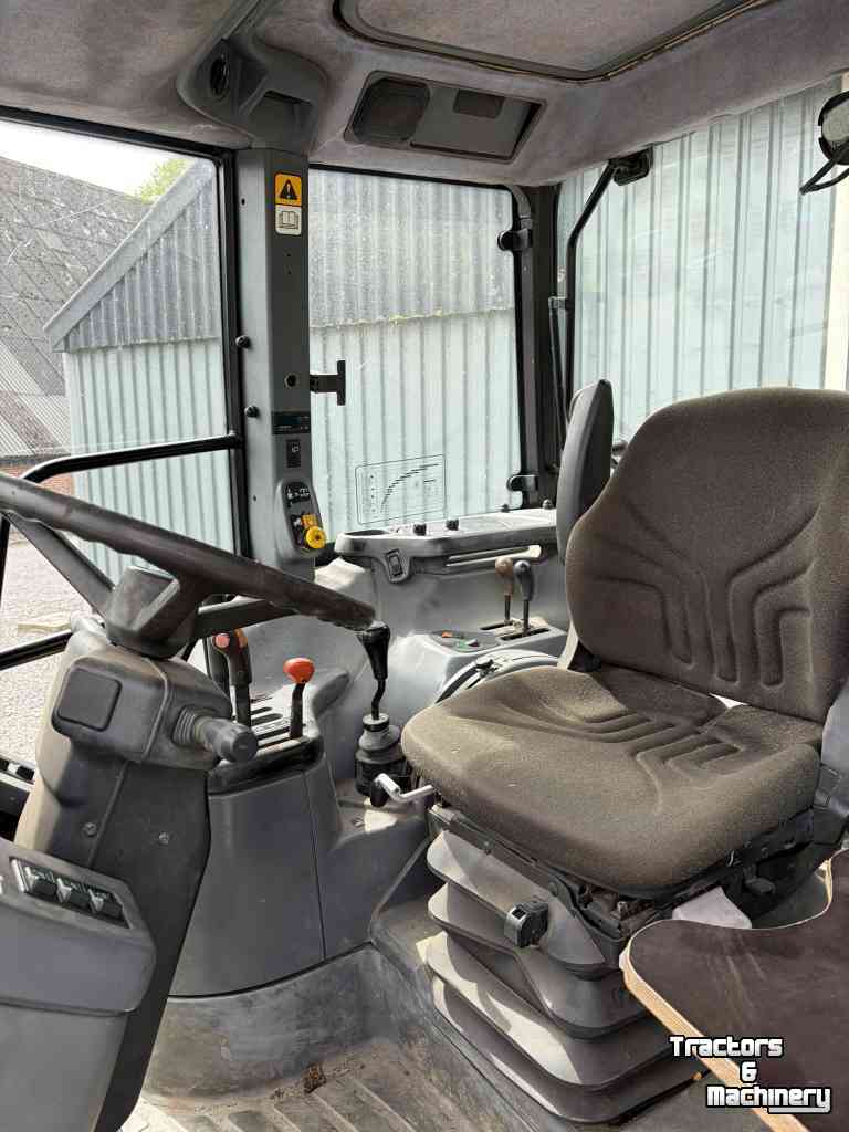 Tracteur New Holland TS100 met kruipbak