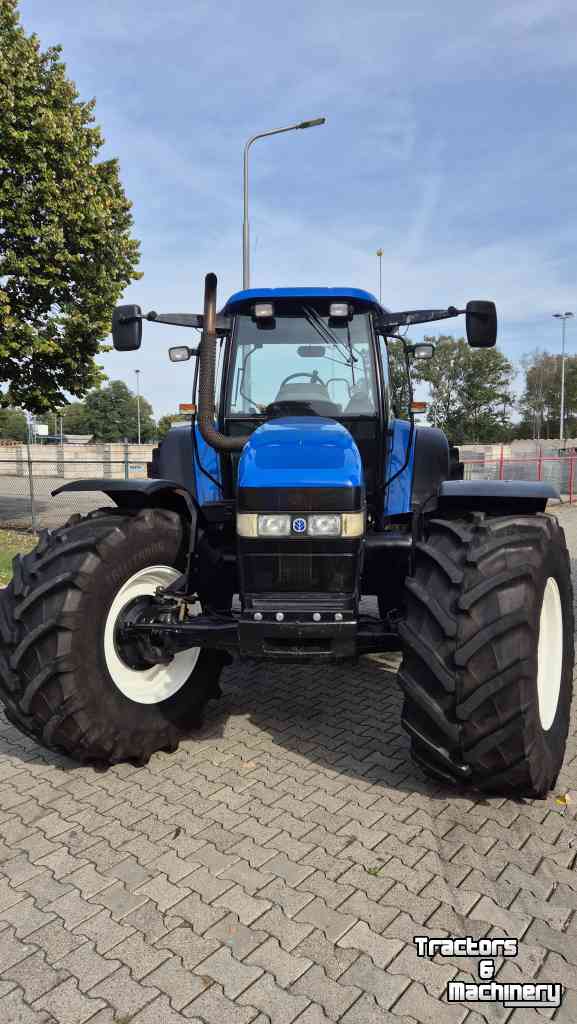 Tracteur New Holland TM155 PC 40Kmh. met kruip en Airco