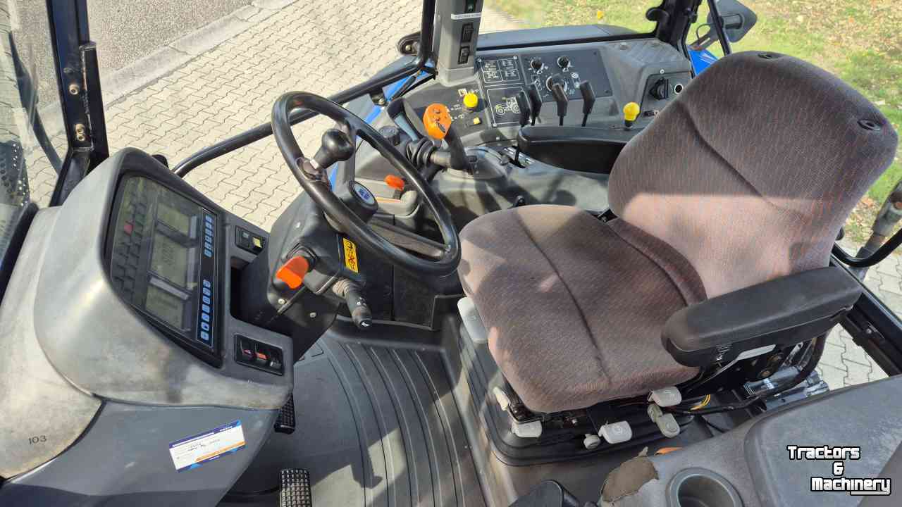 Tracteur New Holland TM155 PC 40Kmh. met kruip en Airco