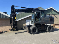Pelles sur pneus Komatsu PW180-10 met LMB  Lastmomentbeveiliging