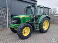 Tracteur John Deere 6120 met Superkruip