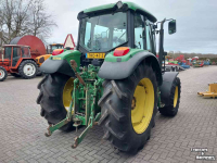 Tracteur John Deere 6120 met Superkruip