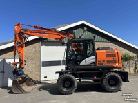 Pelles sur pneus Hitachi ZX140W-5B