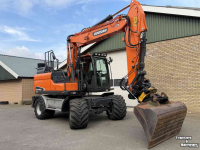 Pelleteuse Doosan DX140w-5 met draaikantelstuk egcon