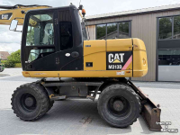 Pelleteuse Caterpillar M313D