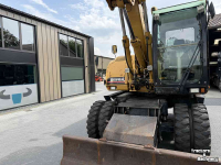 Pelles sur pneus Caterpillar M313D