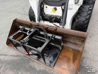 Chargeuse compacte Bobcat Skidsteere grapple