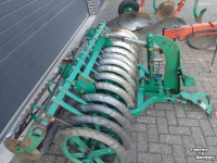Charrues Kverneland VD 85 4 schaar ploeg met Packomat vorenpakker