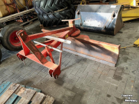Rabot caoutchouc  Grondschuif
