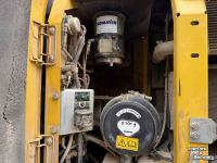 Pelles sur pneus Komatsu PW180-10