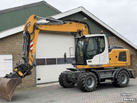 Pelleteuse Liebherr A914 met Engcon draaikantelstuk