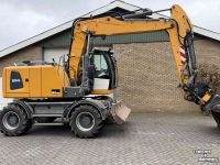 Pelleteuse Liebherr A914 met Engcon draaikantelstuk