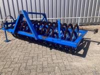 Rouleau compacteur latérale / avant  Vorenpakker voor 4-schaar Ploeg
