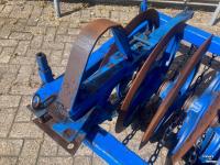 Rouleau compacteur latérale / avant  Vorenpakker voor 4-schaar Ploeg