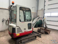 Pelles sur chenilles Takeuchi TB016 met machinetrailer