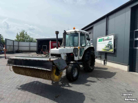 Tracteur Ford 6610 met rolbezem