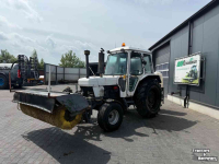 Tracteur Ford 6610 met rolbezem