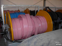 Distributeur à tuyau flexible trainé De With Slangen en slanghaspels