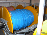 Distributeur à tuyau flexible trainé De With Slangen en slanghaspels