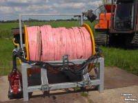 Distributeur à tuyau flexible trainé De With Slangen en slanghaspels