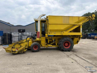 Ensileuse automotrice Hesston Field queen rear dump