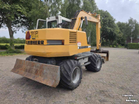 Pelles sur pneus Liebherr 312 banden kraan graafmachine