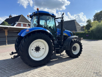 Tracteur New Holland T7030 PowerCommand. Fronthef, Vooras vering, 40km.