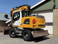 Pelles sur pneus Liebherr A914 met Draaikantelstuk