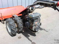 Tracteur porte-outils Reform M3D met bezem