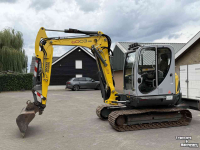 Mini pelleteuse Neuson 6003 met maaikorf functie