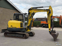 Mini pelleteuse Neuson 6003 met maaikorf functie