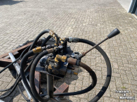 Panneau coulissant de fourrage  Dubbele voerbandveger hydraulisch