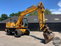 Pelles sur pneus Liebherr A900 Litronic