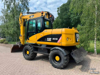 Pelles sur pneus Caterpillar m313d Mobiele kraan