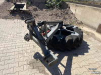 Pousse fourrage à pneu  Aandrukband