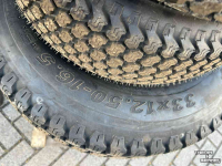 Roues, Pneus, Jantes, Barillets Jumelage New Holland 33x12.50-16.5 +23x8.50-12 Boomer 25 gazon banden