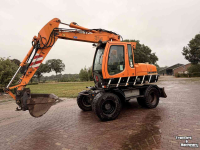 Pelleteuse Liebherr 314