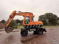 Pelleteuse Liebherr 314