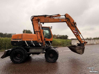 Pelleteuse Liebherr 314